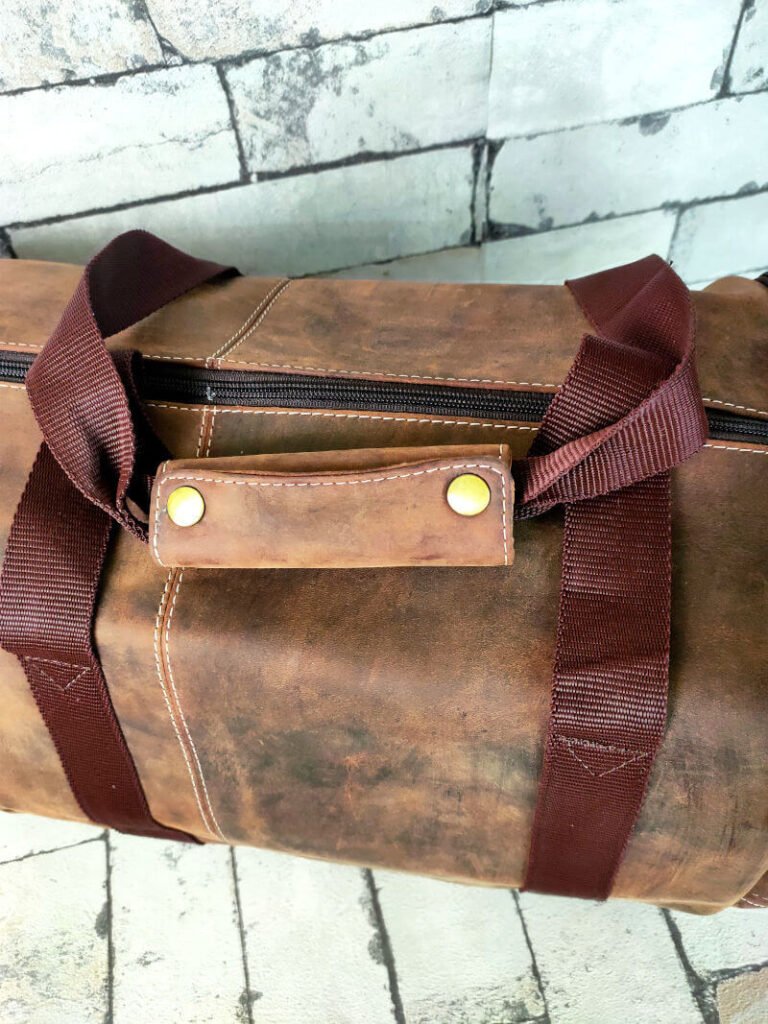 Hunter leather duffle bag with flexible carry handles